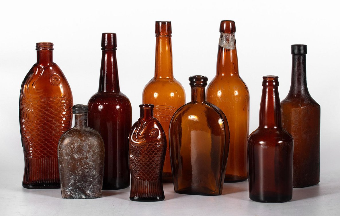 Grouping of Vintage Amber Glass Bottles