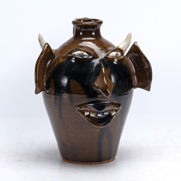 Folk Art Pottery Face Jug by Otis Norris