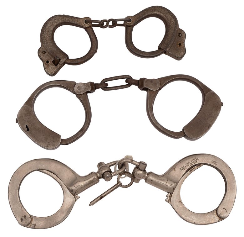 Three Pairs of Early Handcuffs