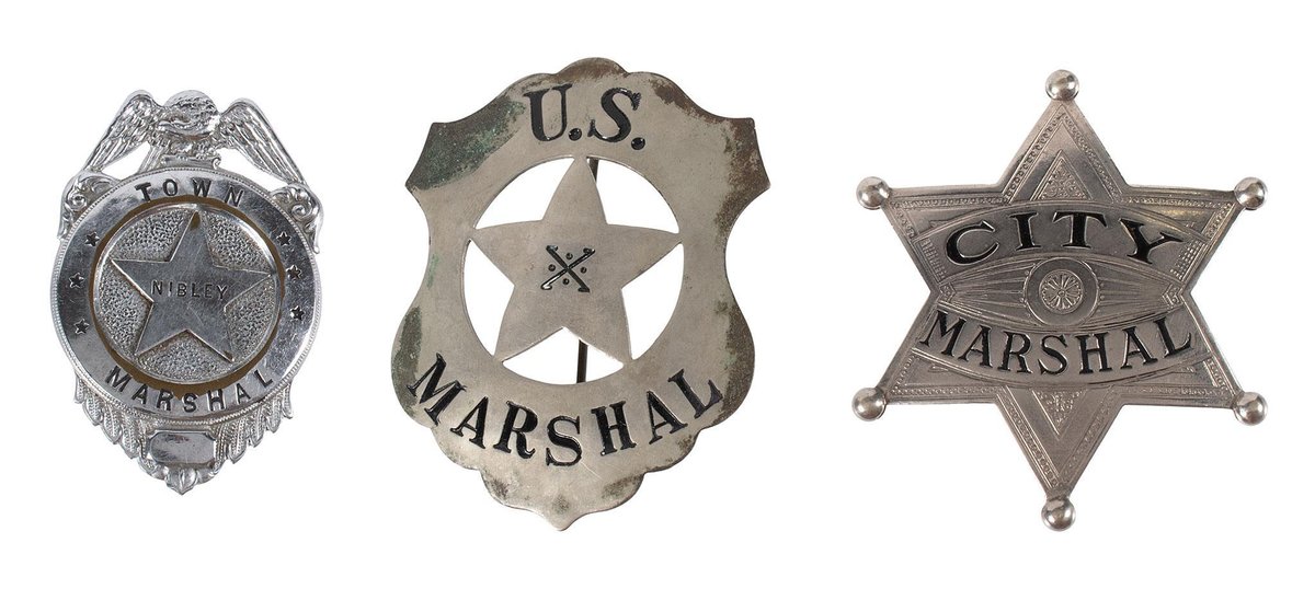 Three Obsolete Marshal's Badges