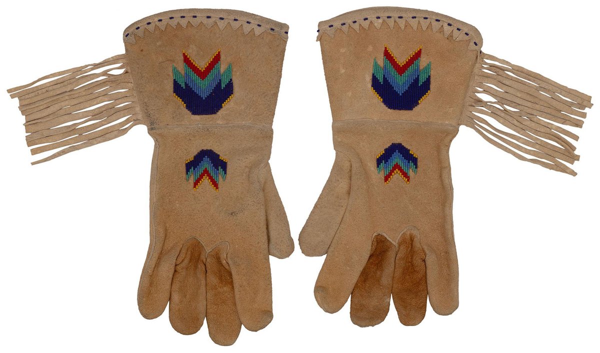A Pair of Beaded Hide Gauntlets