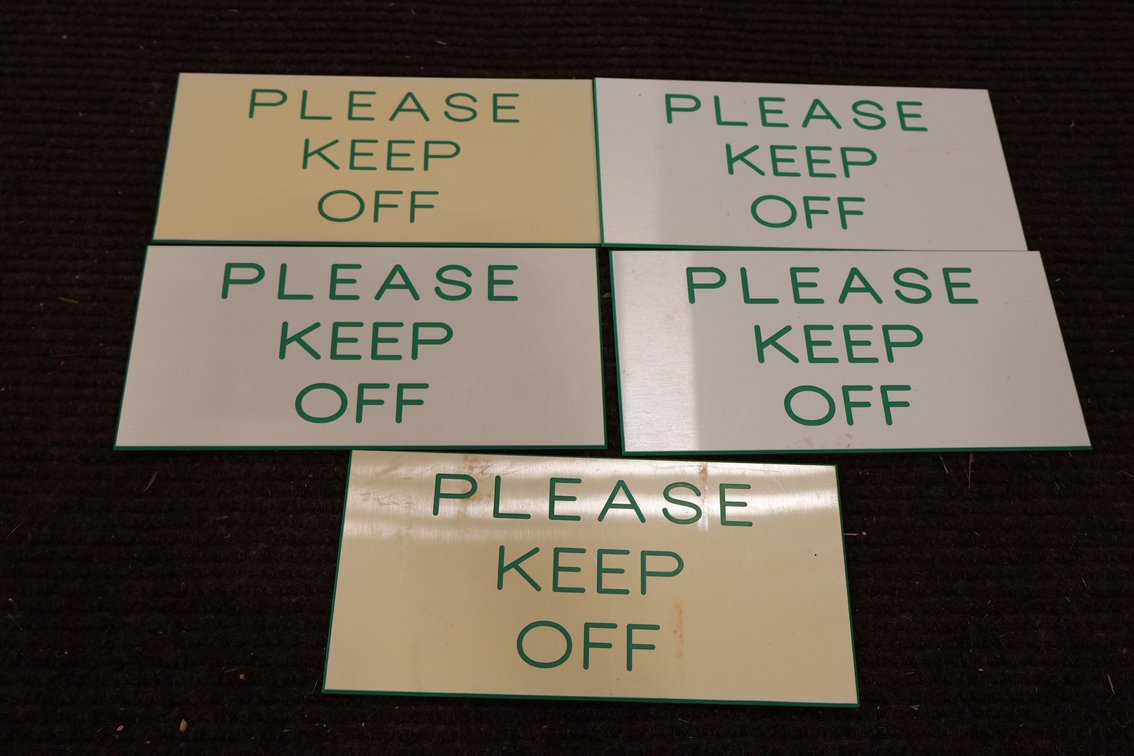 "Please Keep Off" Signs