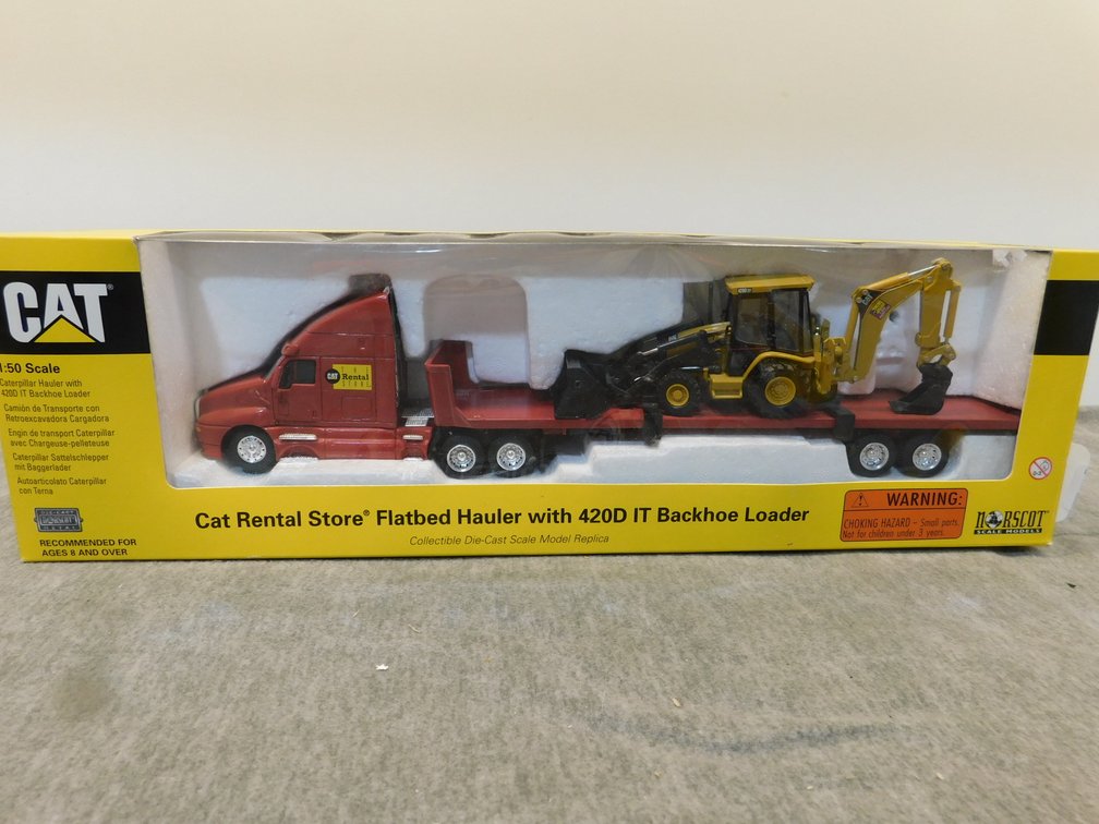 CAT Rental Semi with Backhoe