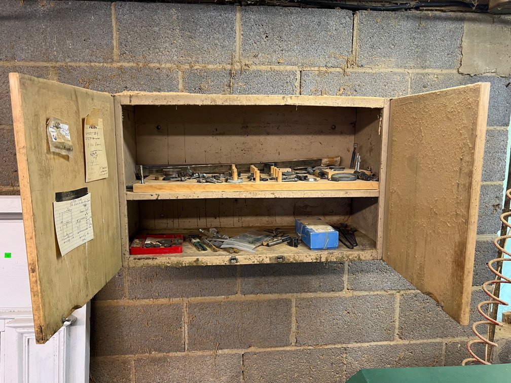 Cabinet with shaper knives and bits