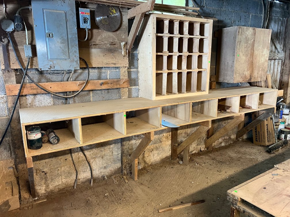 Workbench with storage cubbies, cabinet