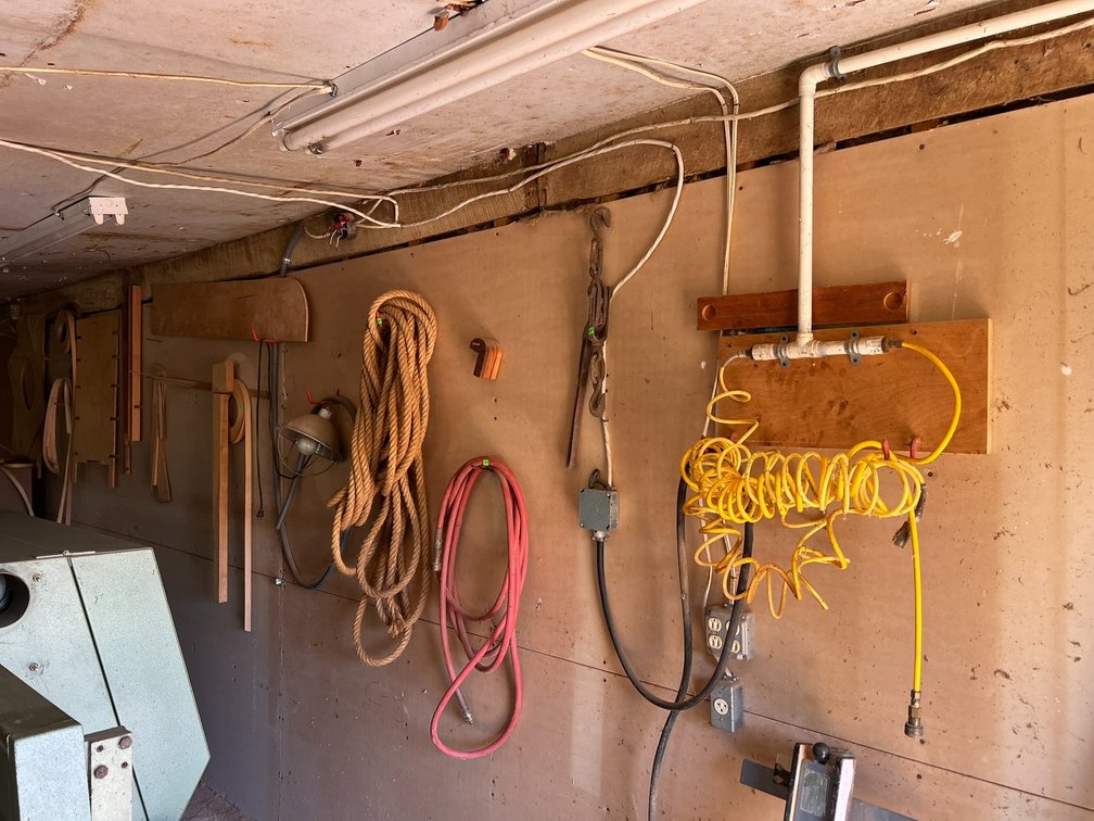 Items on wall and cabinet and contents