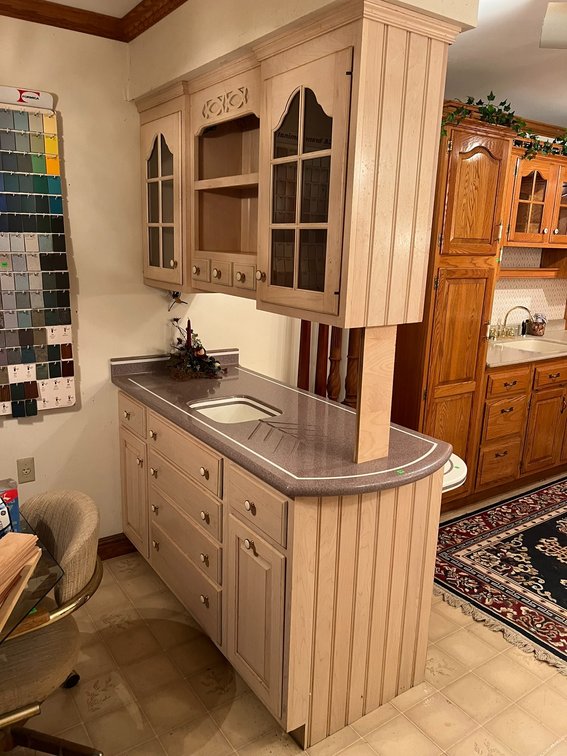 Kitchen bar and upper cabinets