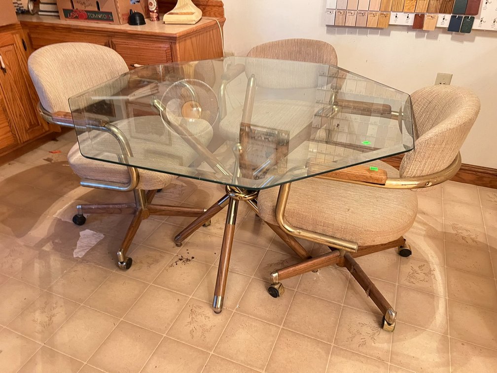 Glass top table and three chairs
