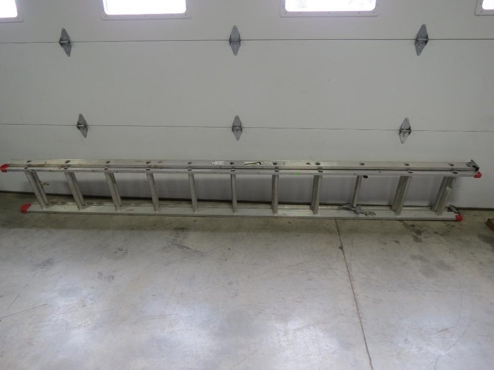 An aluminum extension ladder.