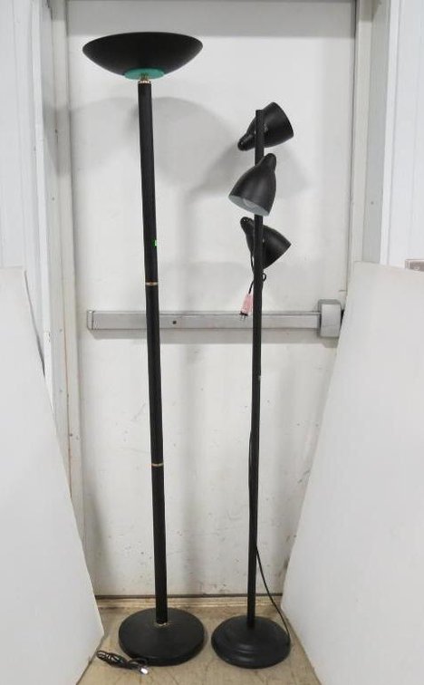Two modern style metal floor lamps.