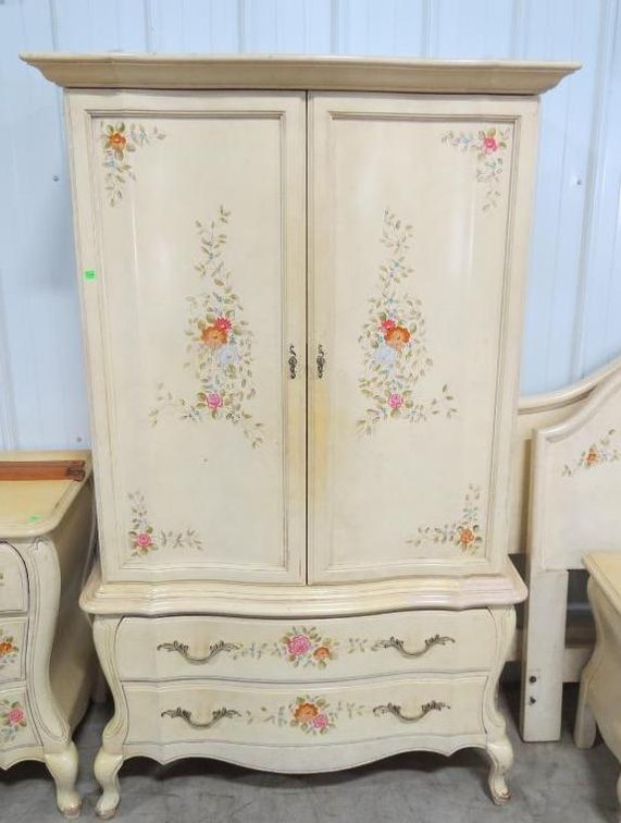 A yellow Romweber armoire with painted flower details. Please preview for condition.