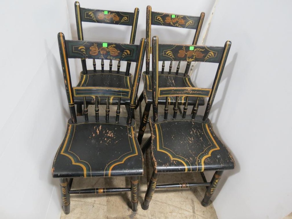 Set of four painted plank bottom chairs.