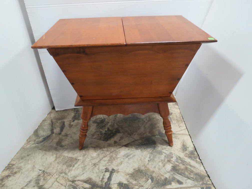 A split top standing storage cabinet.