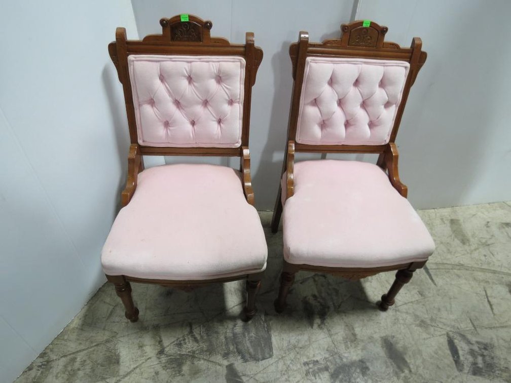 A matching pair of Eastlake style chairs with velveteen upholstery.