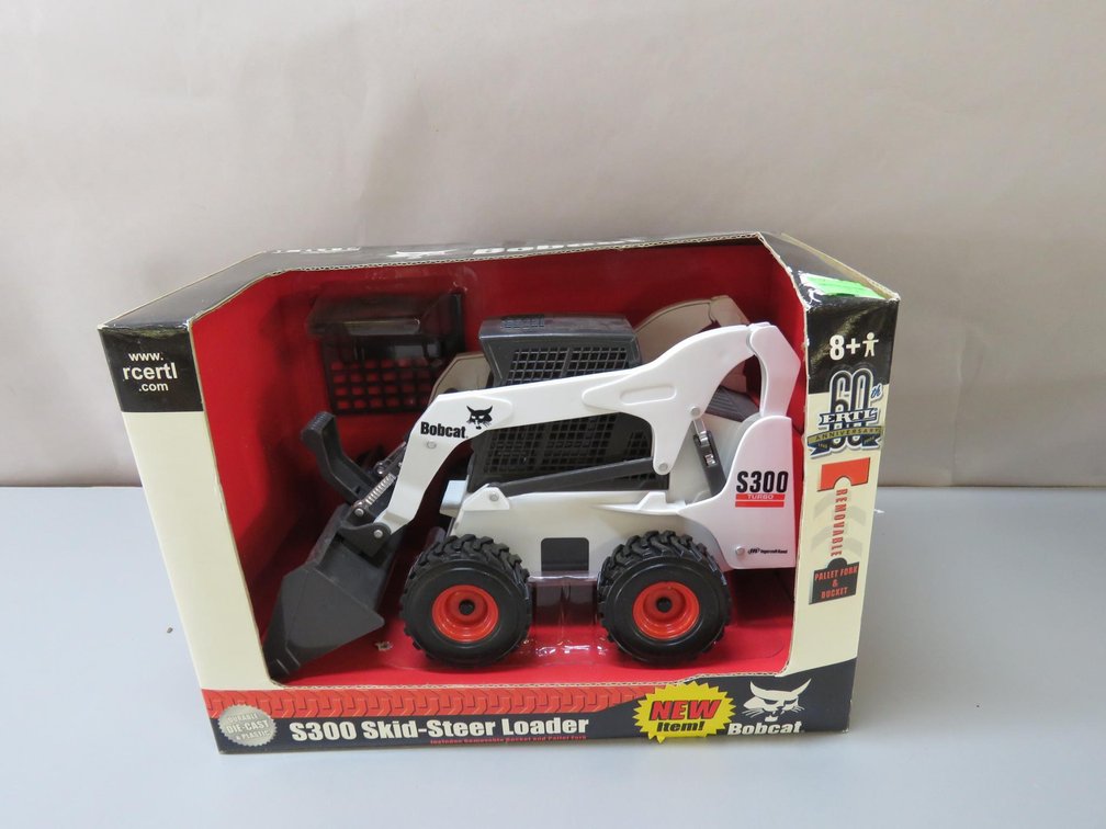 Bobcat S300 Skid Steer Loader With Removable Bucket and Pallet Fork