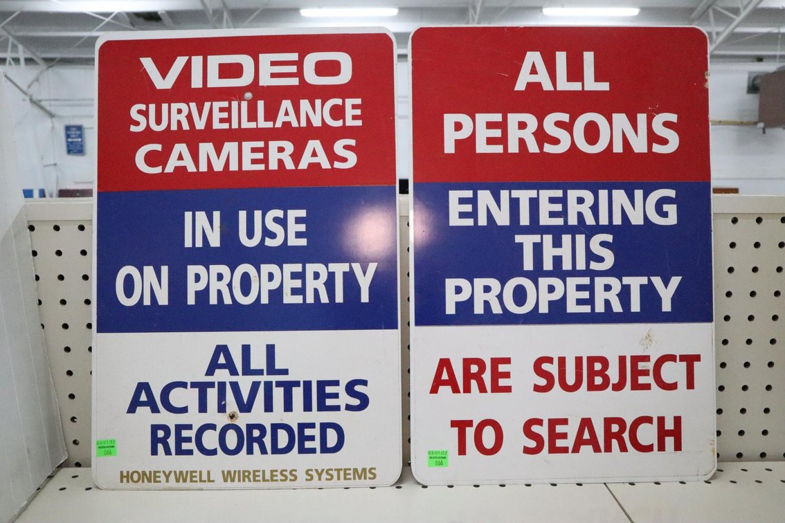 Pair of Metal Signs