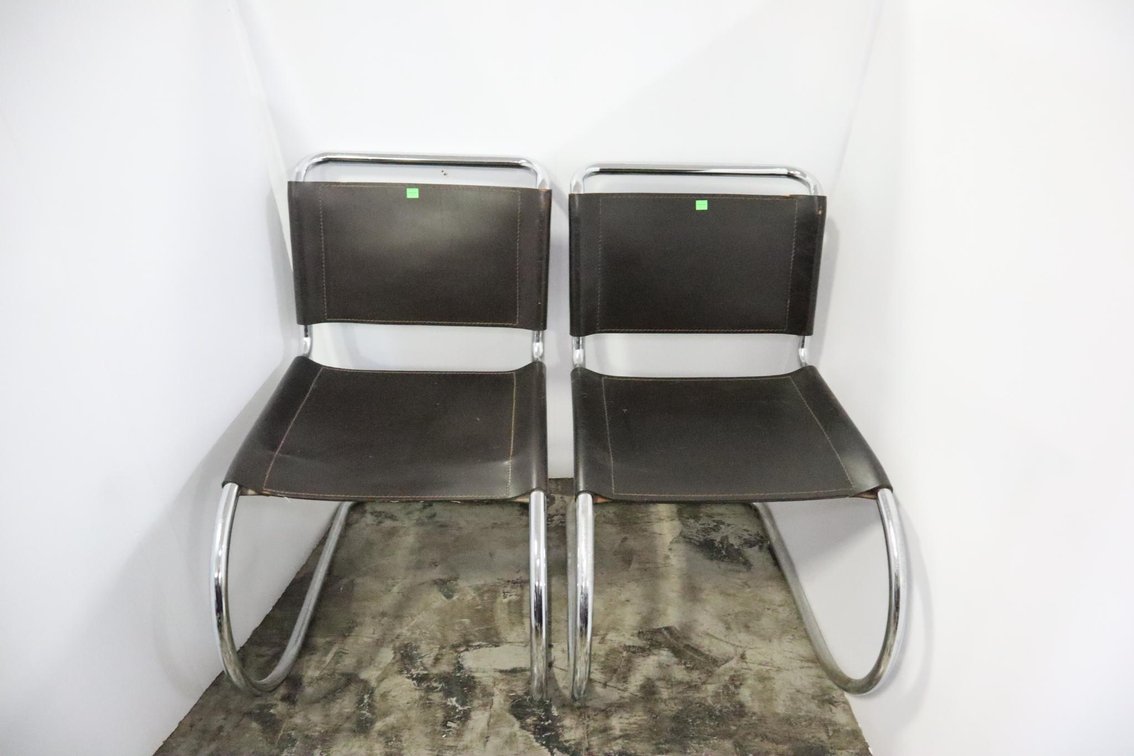 Two Modern Style Chairs With Leather Seats