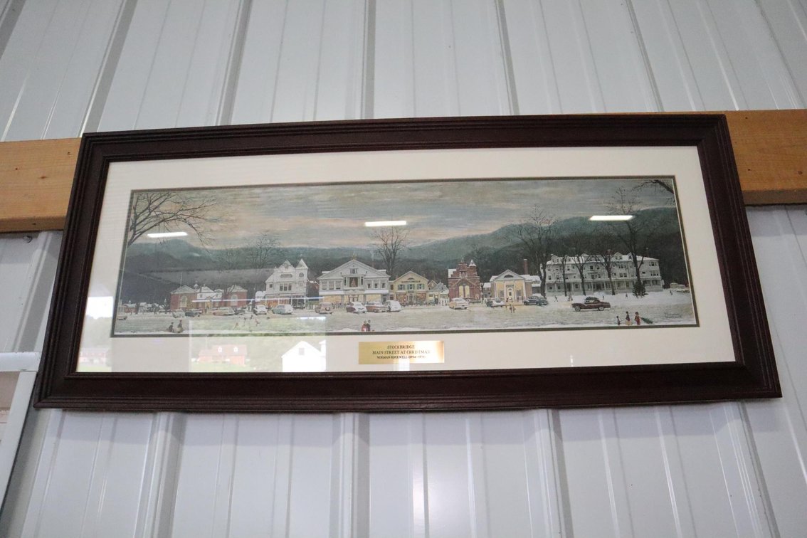 Stockbridge Main Street At Christmas By Norman Rockwell Framed Print