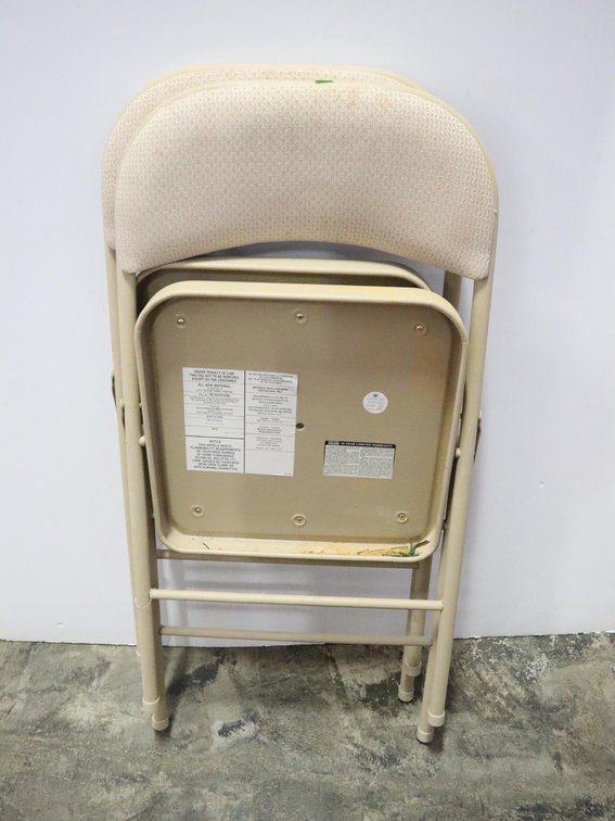 Two Metal Folding Chairs