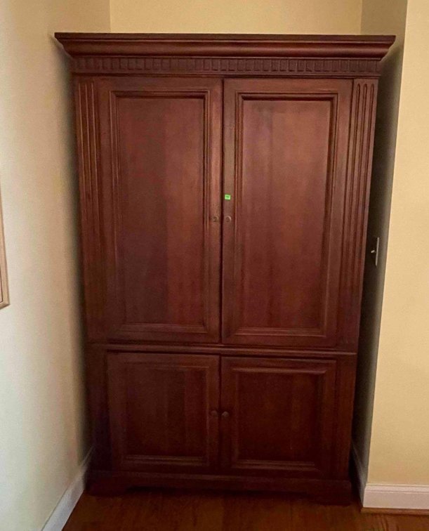 Armoire With Artificial Flowers