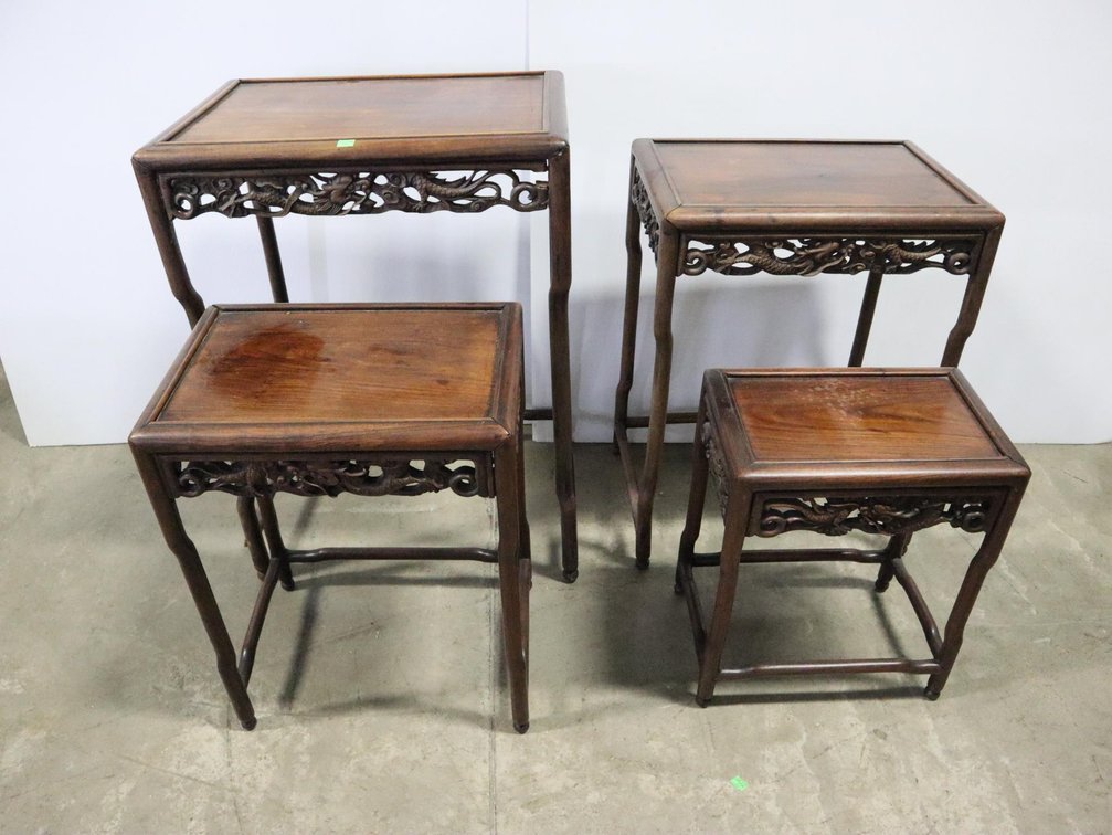 Four Nesting Tables With Ornate Carved Sides