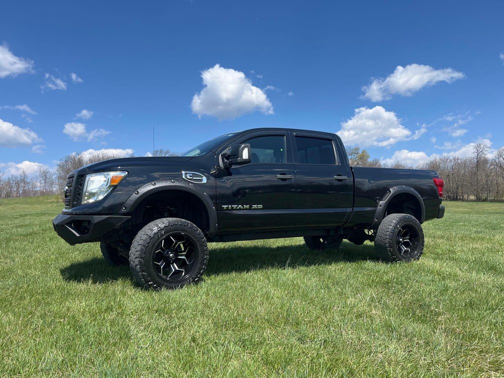 2017 Nissan Titan XD Turbo Diesel, 50k Miles Year: 2017 Make: Nissan Model: Titan XD Vehicle Type: Pickup Truck Mileage: 50,443 miles Body Type: 4 Door Cab Drive Line: 4WD Engine Type: V8, 5.0L; Turbo Fuel Type: Diesel Transmission: Automatic VI