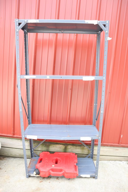 Metal Shelf and A Gas Jug