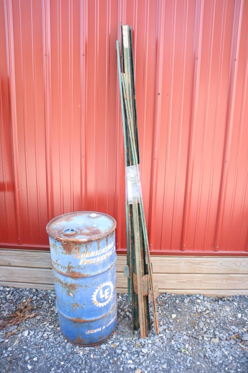 6 Metal Posts and Metal Barrel