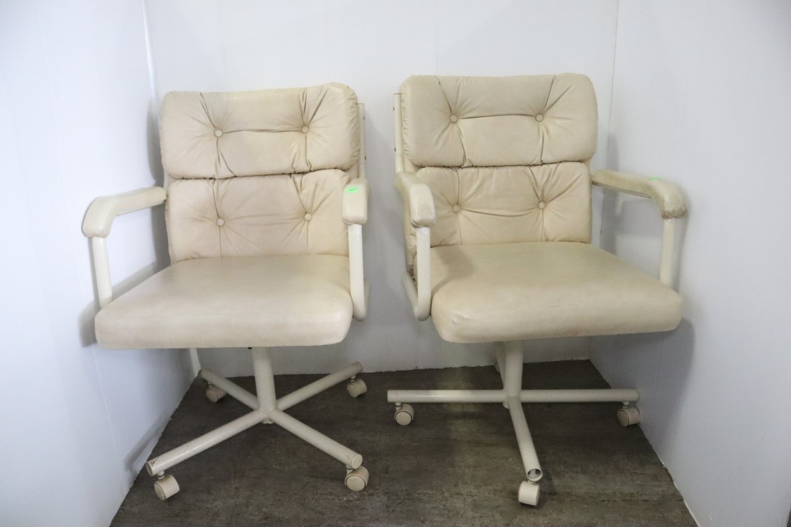 Pair Of Rolling Swivel Chairs