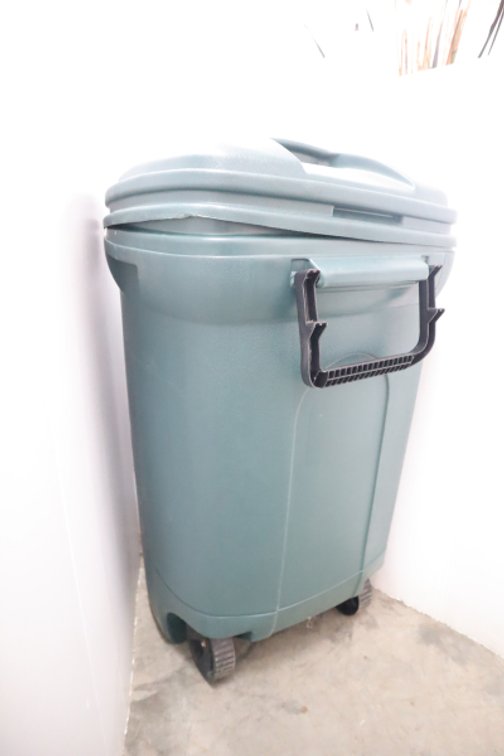 Plastic Trash Can With 2 Bags of Weed and Feed Lawn Fertilizer
