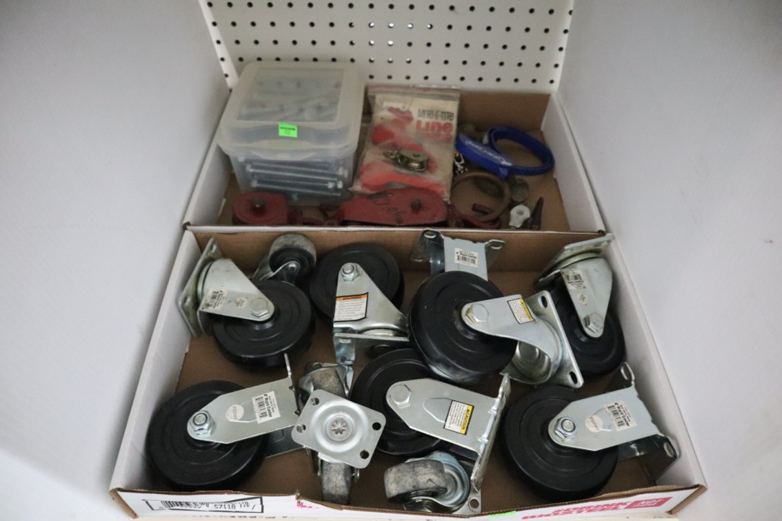 Container of Bolts, Some Pulleys, Casters