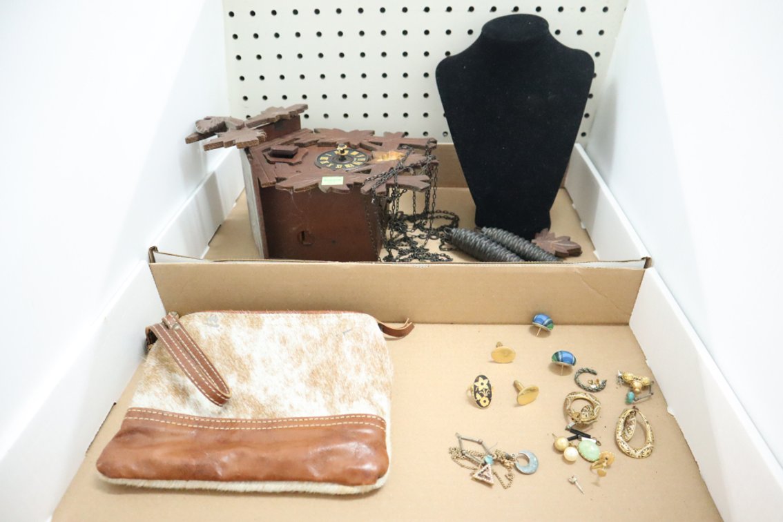 Cuckoo Clock, Hair Hide Purse, Necklace Display, Some Jewelry,