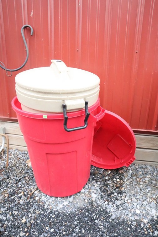 Pair of Trash Cans With Lids