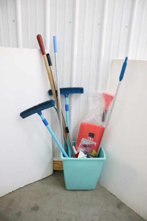 Trash Can With Cleaning Items