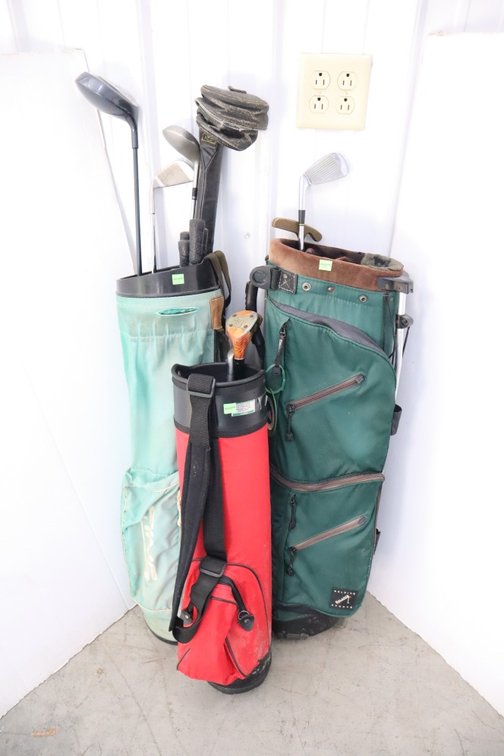 Group of Golf Bags and Golf Clubs