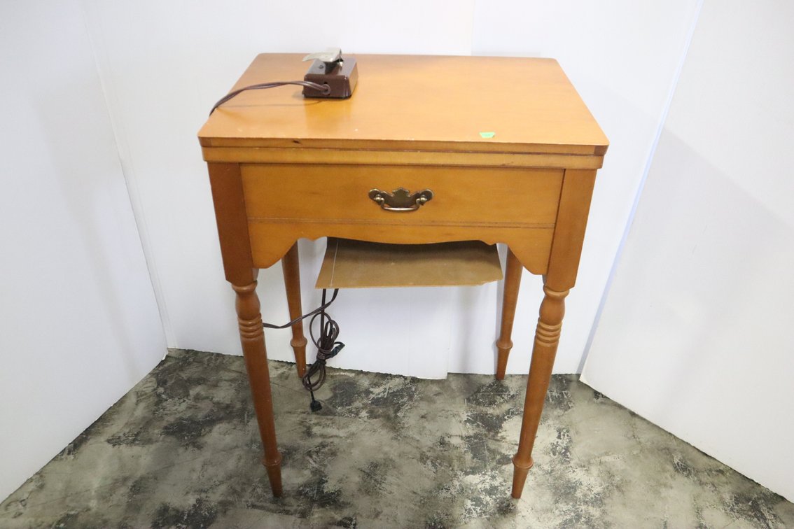 Sewing Machine In Cabinet
