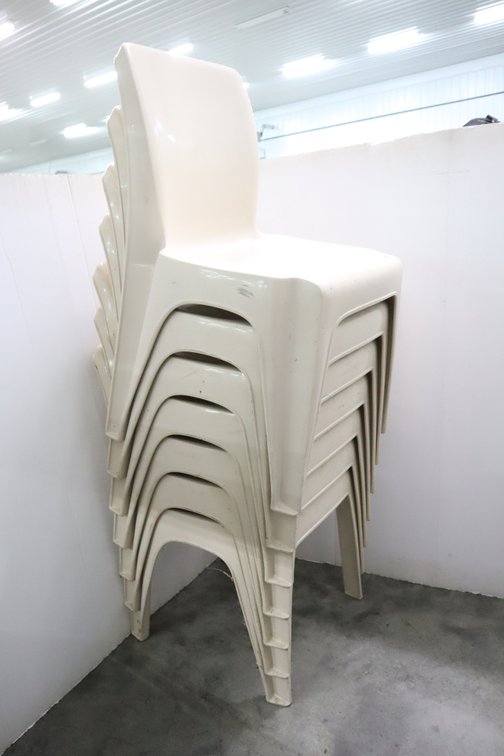 7 Plastic Stacking Chairs