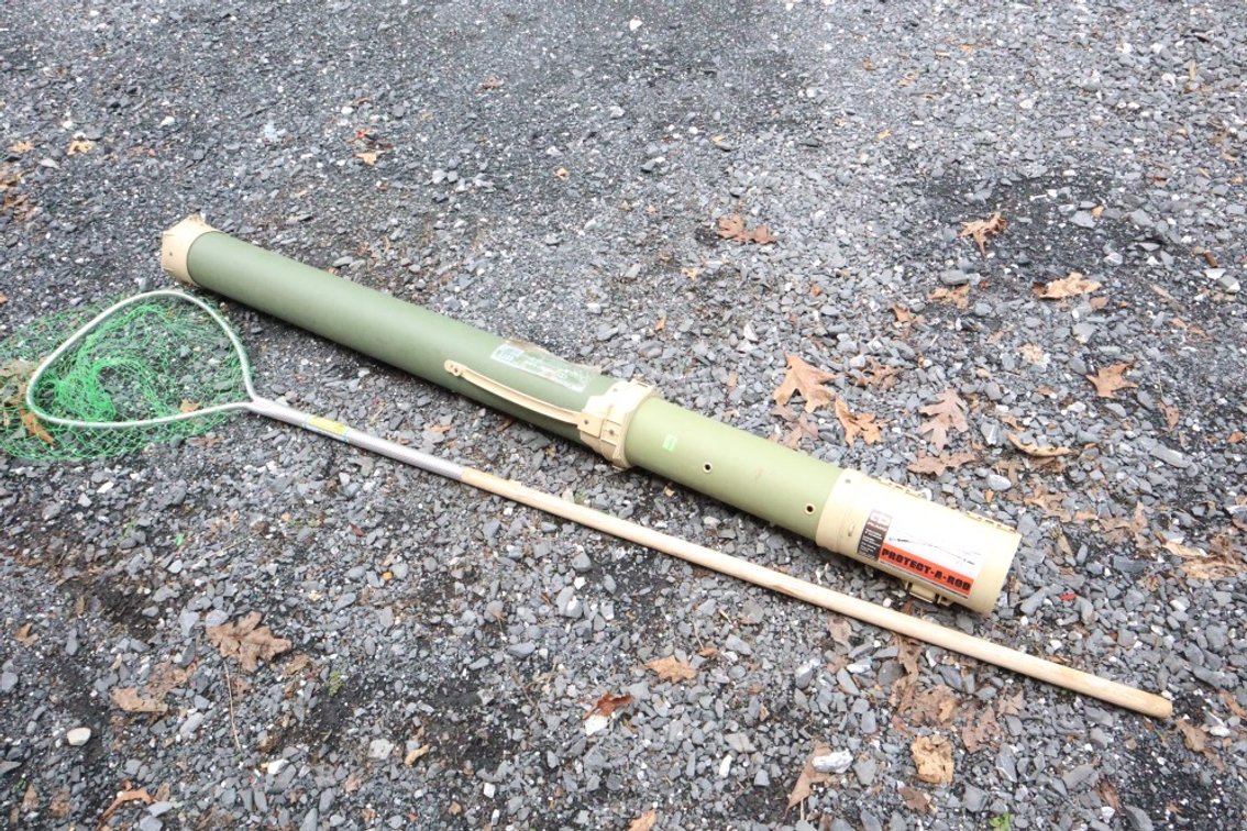 Plano Fishing Rod Case and A Fishing Net