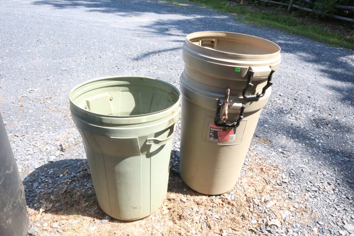 Three Plastic Trash Cans