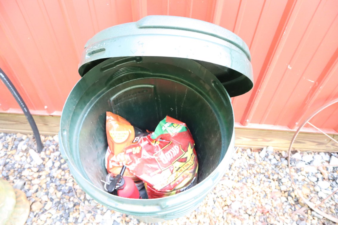 Plastic Trash Can With Insect Killer and Fire Extinguisher