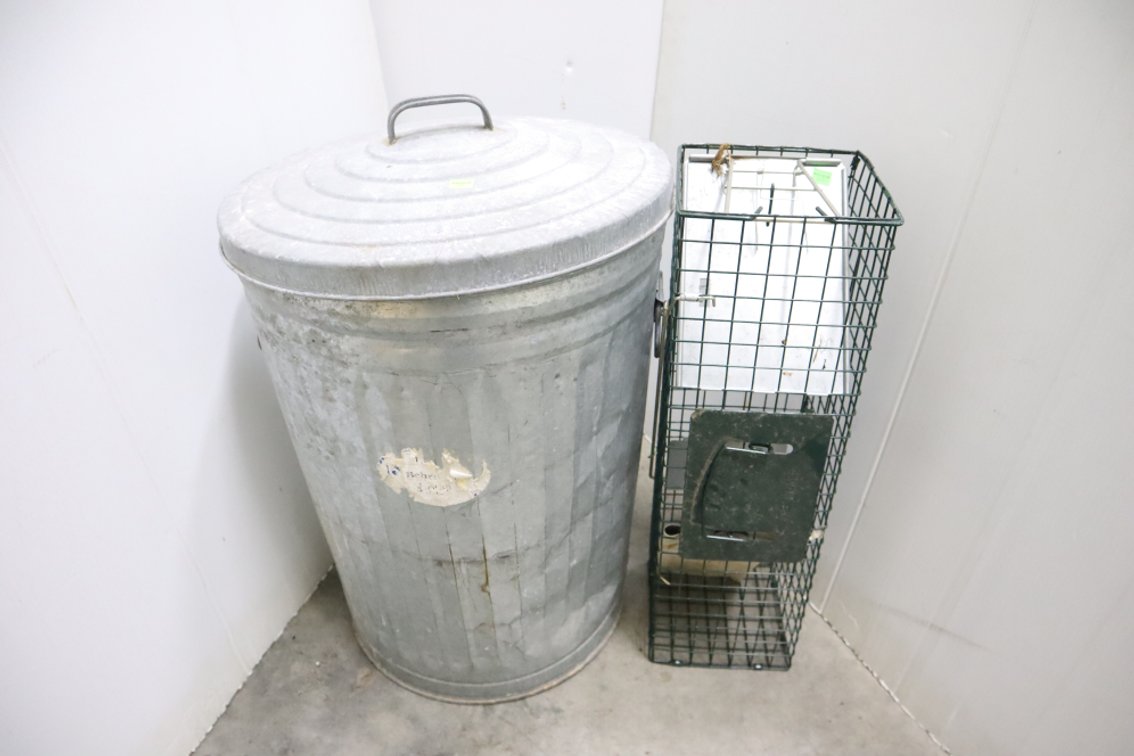Metal Trash Can, Bag of Triple 10 Fertilizer, Small Live Trap