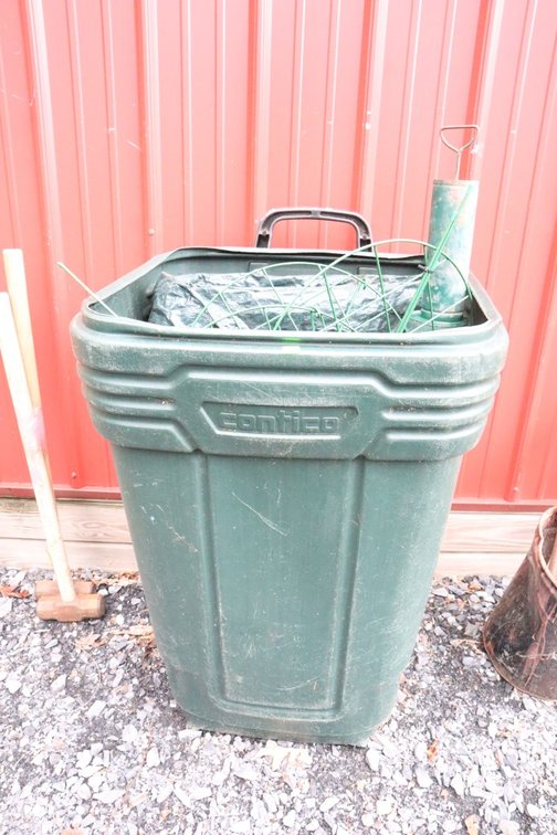 Plastic Trash Can With Tarp and Pruners