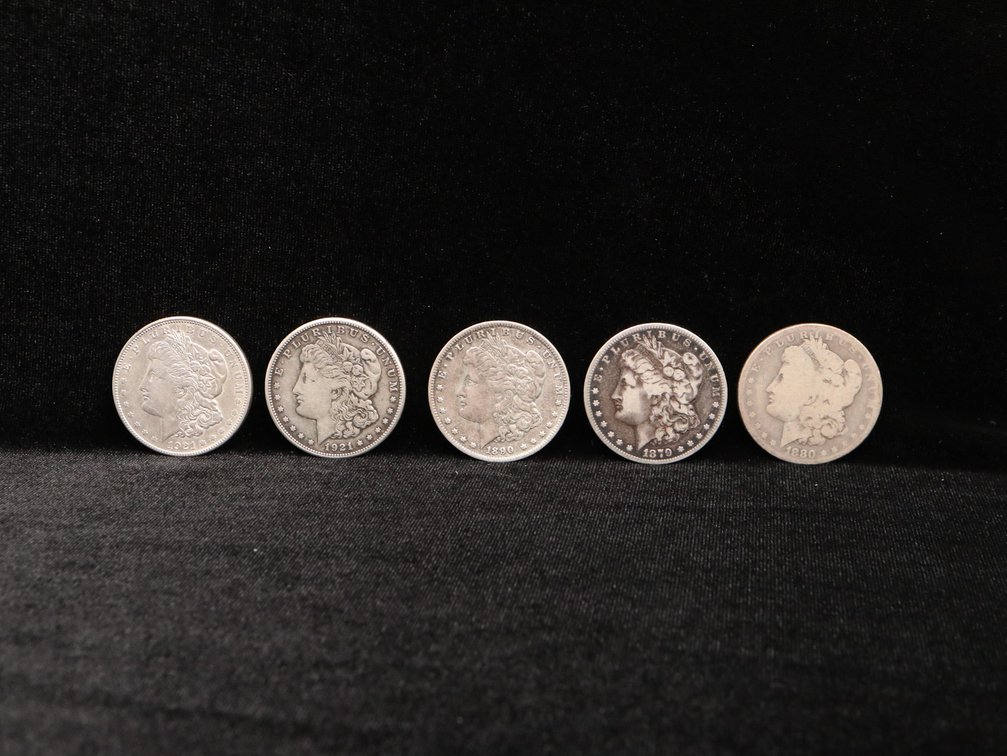 Five Morgan Silver Dollars. Assorted Common Dated. Circulated