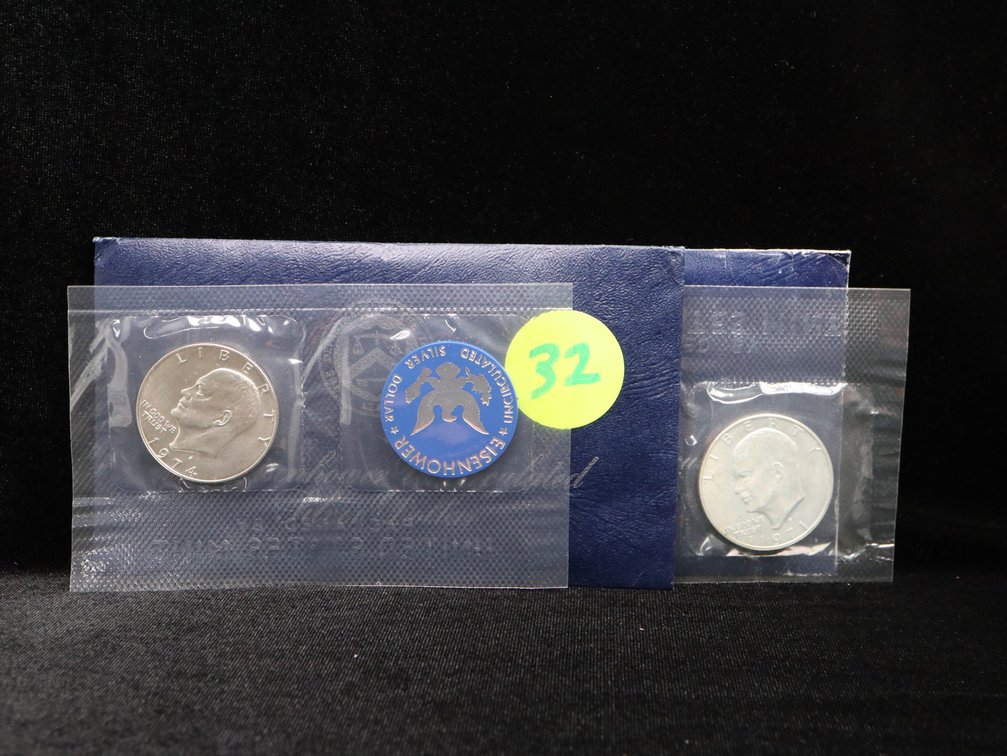 1971 & 1974 Eisenhower Dollars in Blue Envelope. 40% Silver. Unc.
