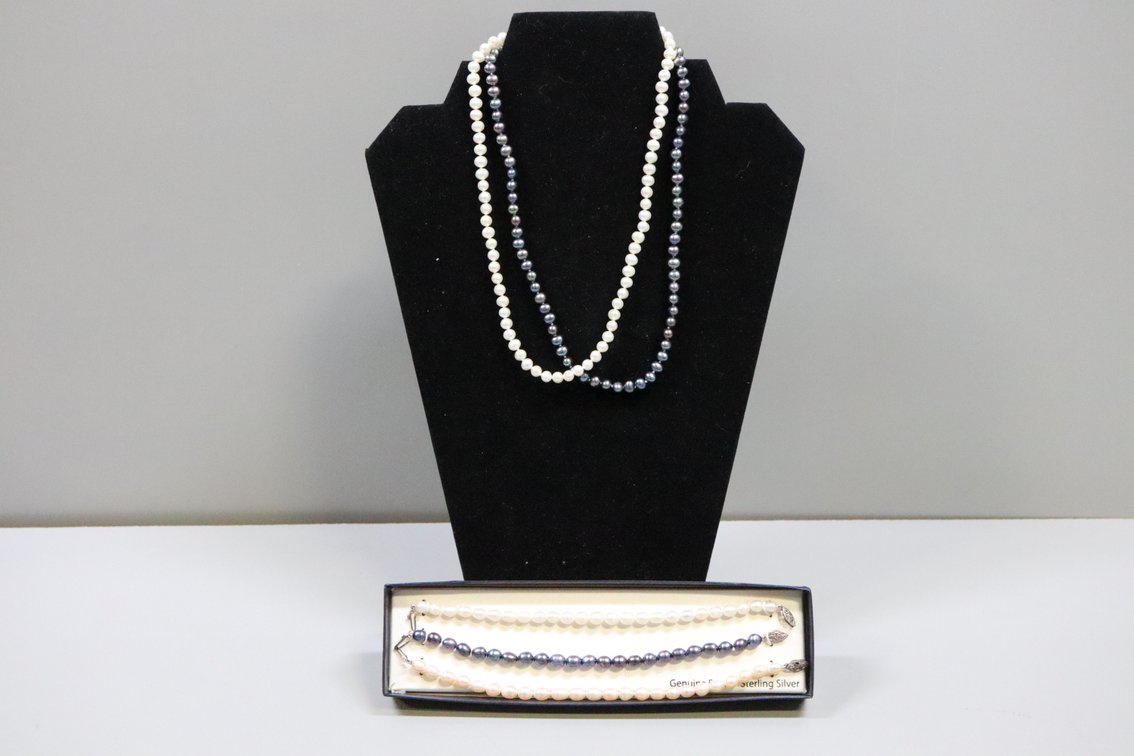 3 pearl bracelets, 1 pink, 1 black, 1 white, with Sterling Silver clasps, 1 white cultured pearl necklace with SS clasp, 1 cultured black pearl necklace with SS clasp. 