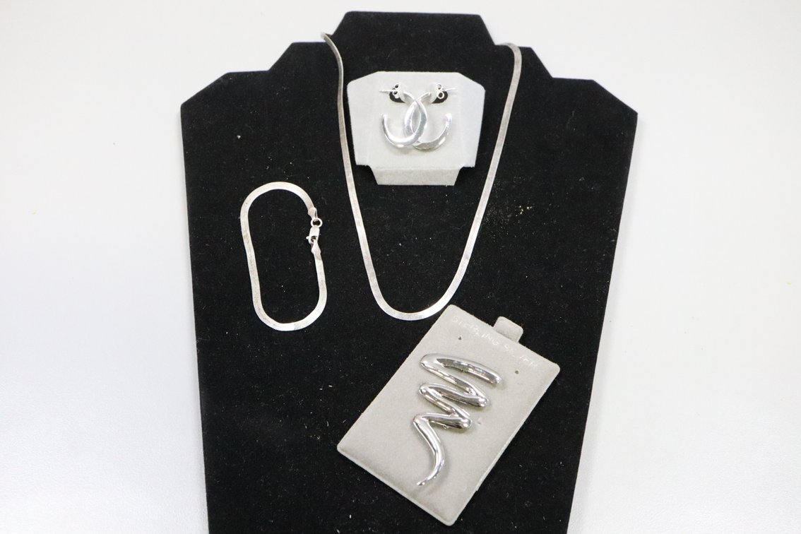 SS 17.5" necklace with matching SS bracelet, SS brooch, SS hoop style earrings