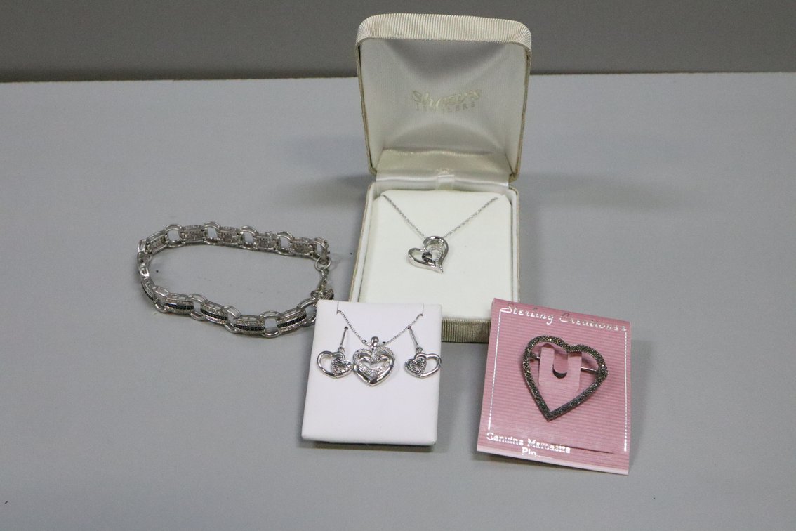SS heart pendant on chain with black and white stones, SS bracelet with black and white stones, SS CZ double heart necklace with earrings, SS marcasite heart brooch