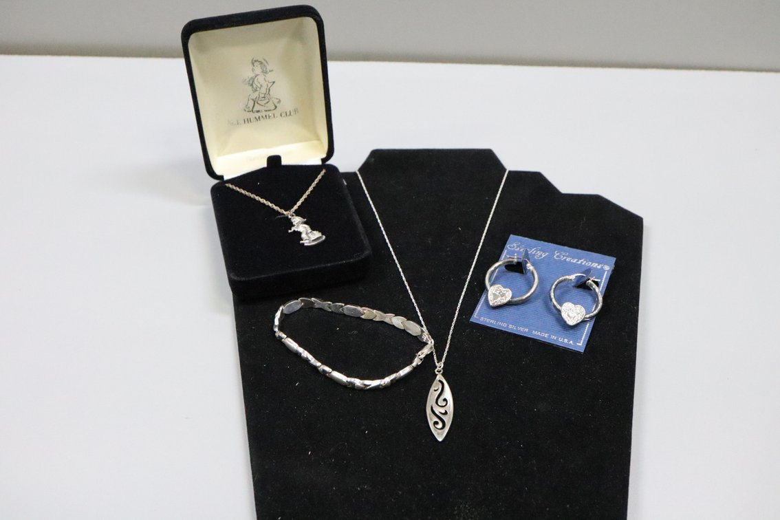SS M.I. Hummel Club necklace, SS hoop earrings with hearts, SS bracelet, SS swirl pendant with chain