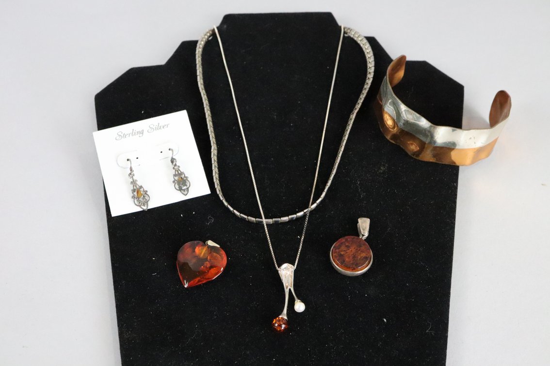 Silver 18.5" Napier necklace, L Vernon Silver genuine Copper bangle, SS chain with amber and pearl pendant, SS round amber pendant, Heart shaped amber pendant, SS drop earrings with honey colored stone. 