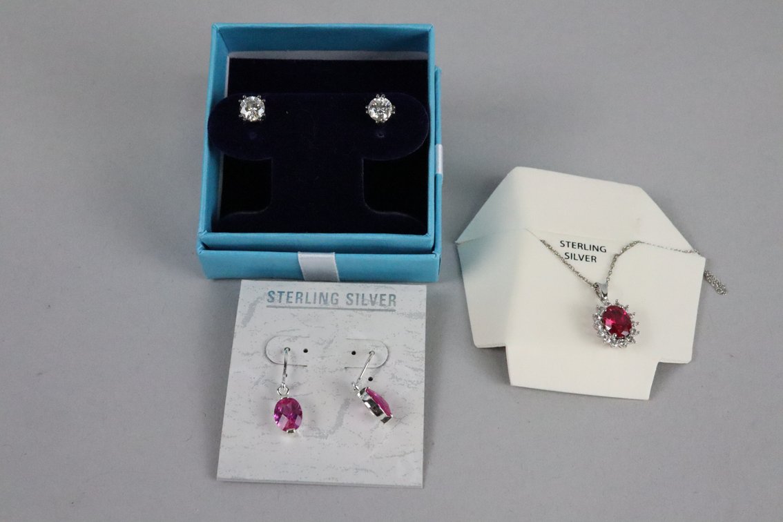 SS created ruby with white sapphire pendant on chain, Silver studs with white stones, SS dangle earrings with pink stones